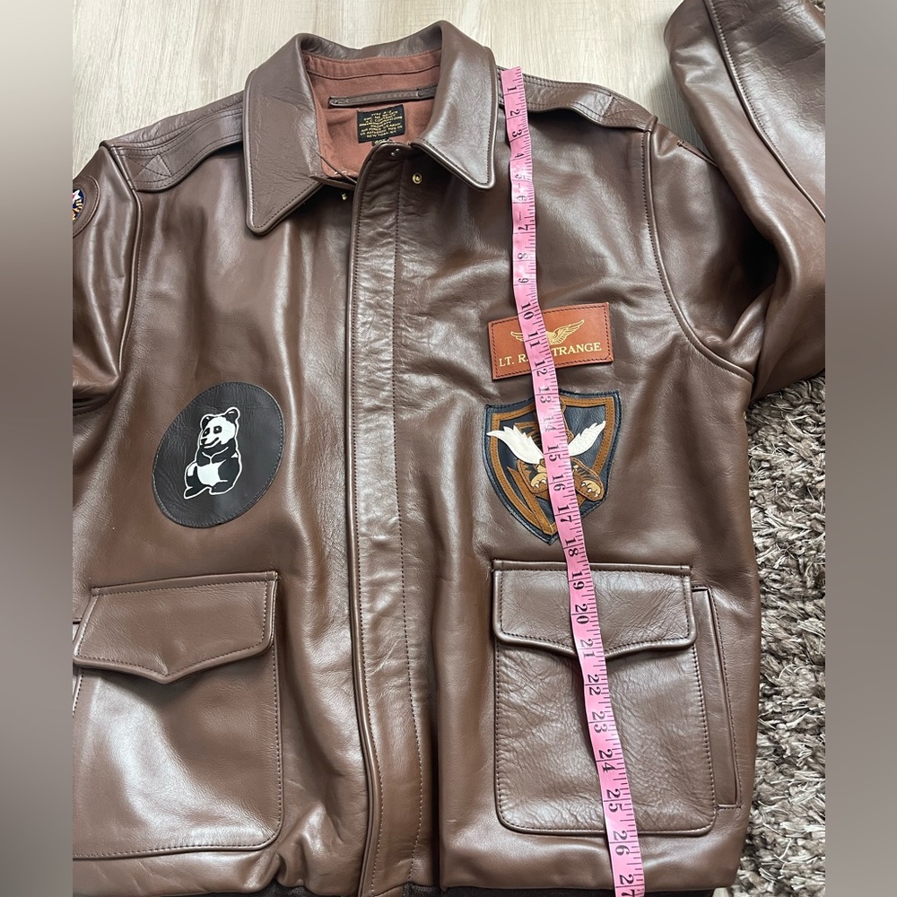 Vintage-Inspired Brown Leather Bomber Jacket with Patch Accents - Picture 8 of 10